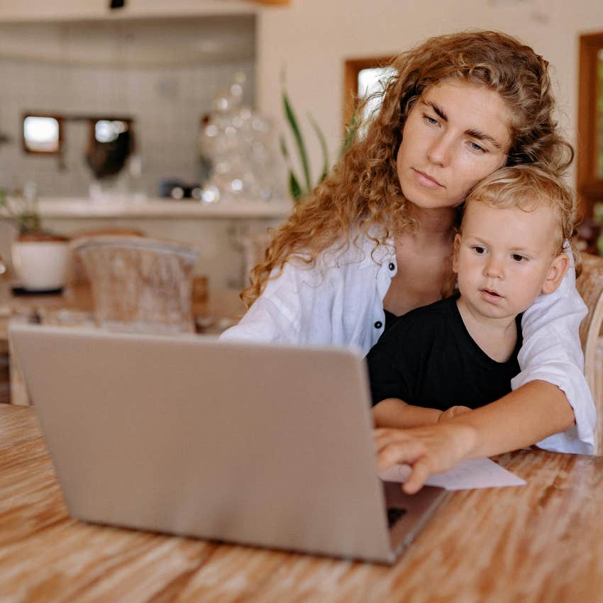 mom on computer with child