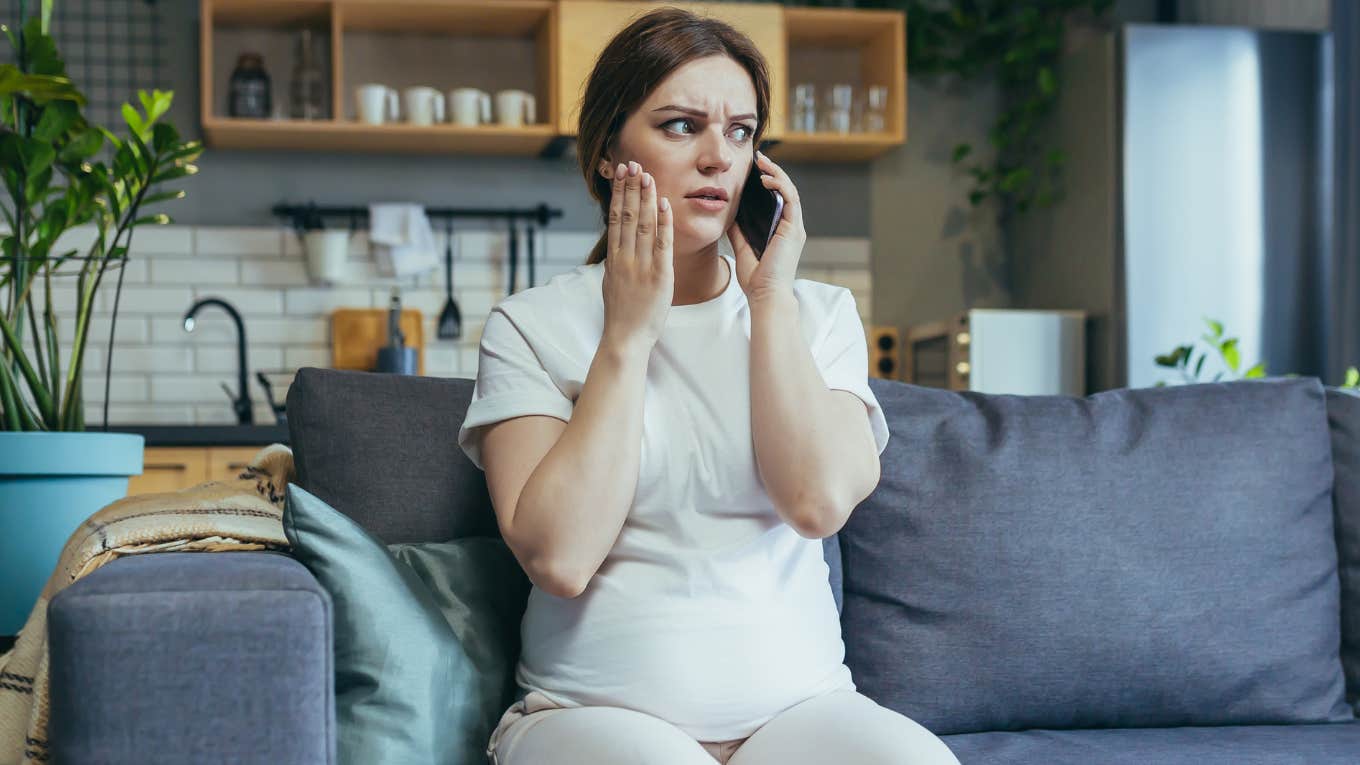 Pregnant mom sitting alone on Mother's Day