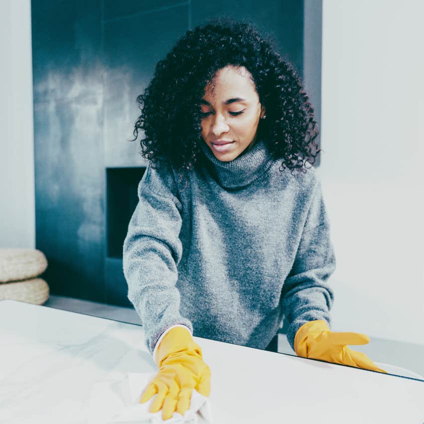 woman cleaning counters