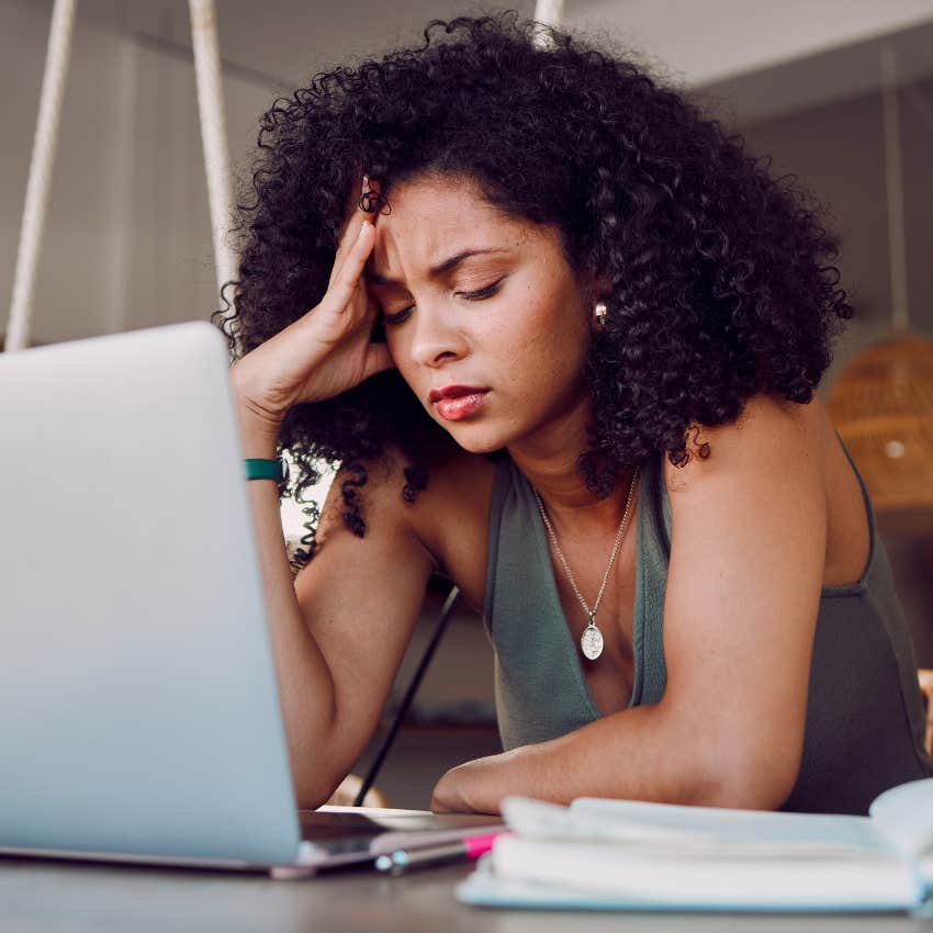 stressed out woman at computer 
