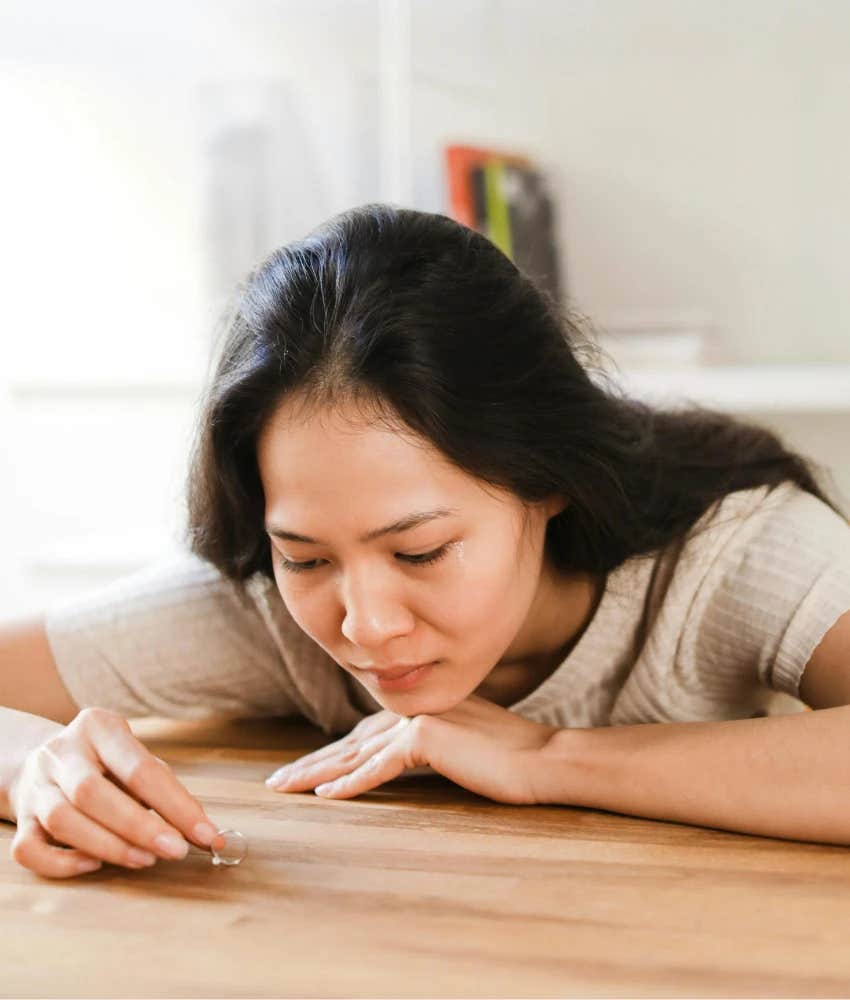 Sad woman wondering if she should leave her husband