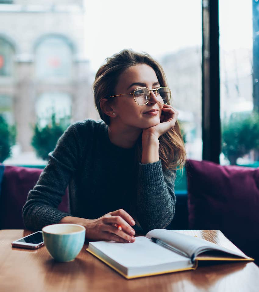 She is journaling to relax and find anxiety relief