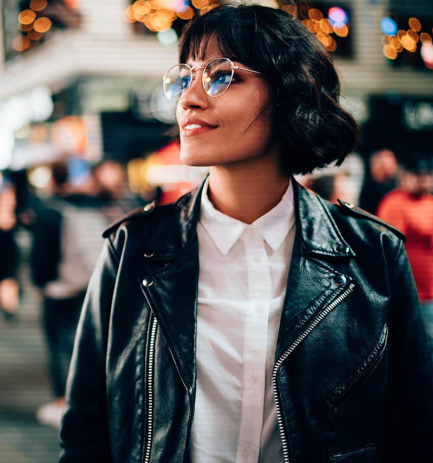 Woman enjoying a walk in city for self care