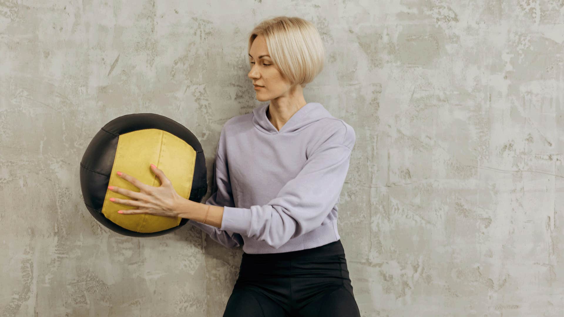woman with medicine ball working out