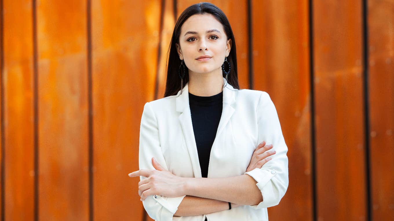 disciplined woman with her arms crossed