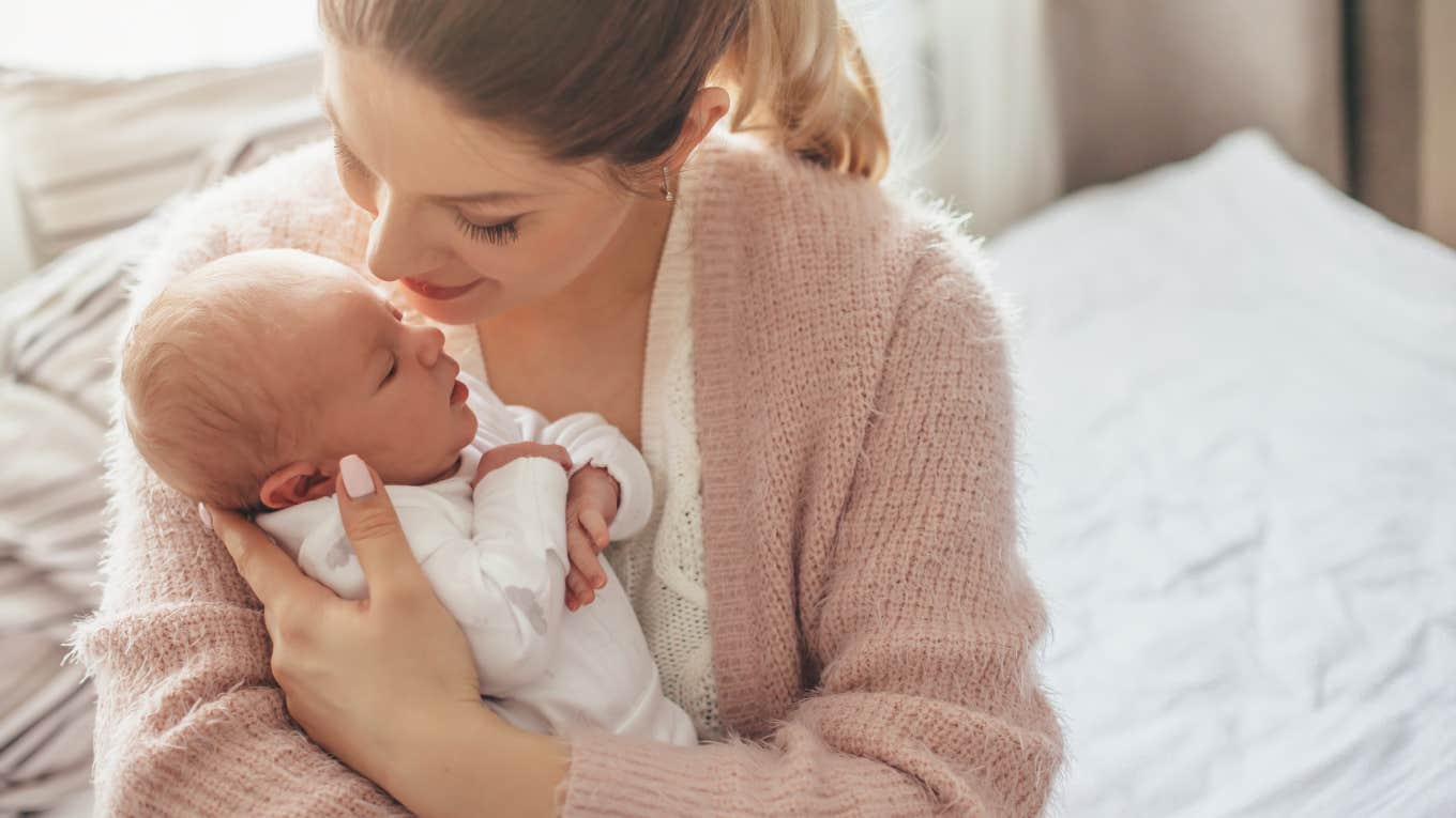 Single Mom Refuses To Babysit For Married Friend While She Is On Sabbatical mom holding newborn baby