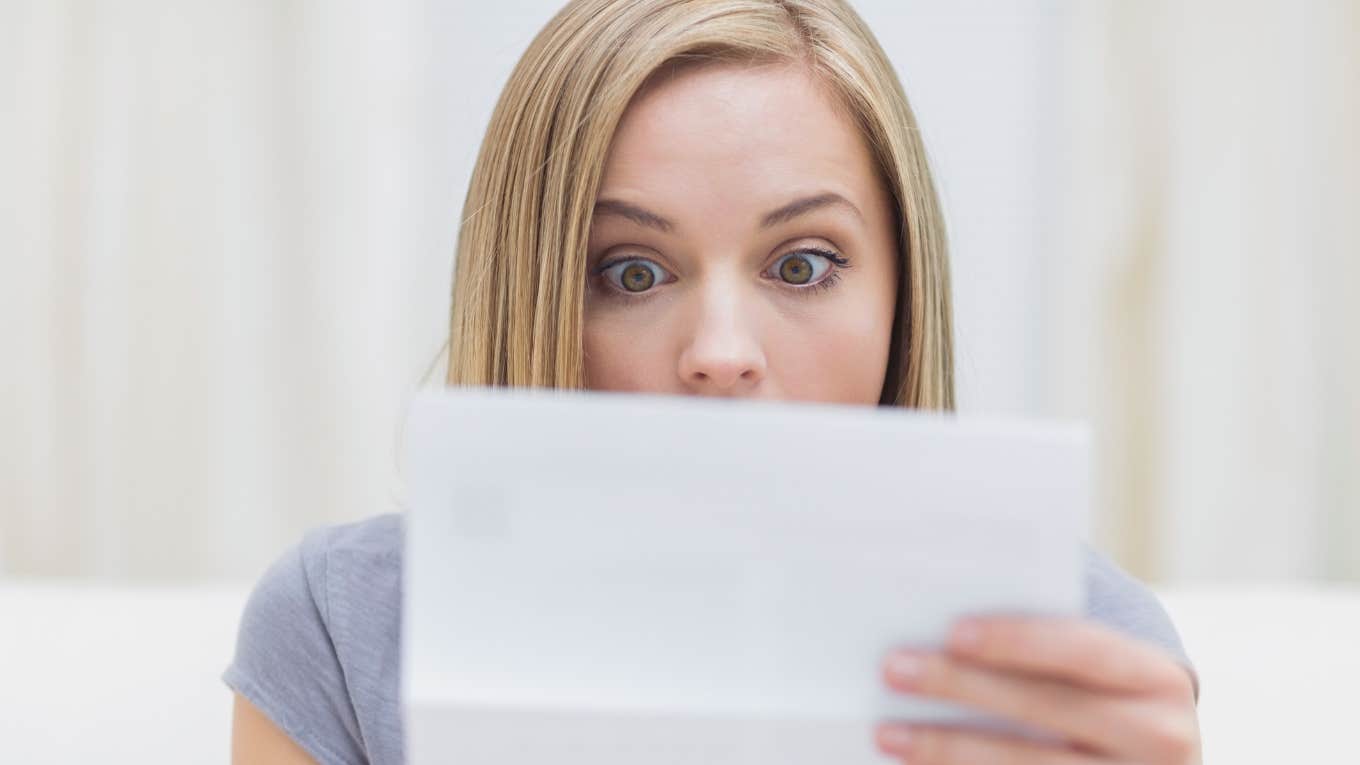 Student's Parents Opened Credit Cards In Her Name & Now She Owes $15k In Debt woman shocked after finding out her parents opened credit cards in her name