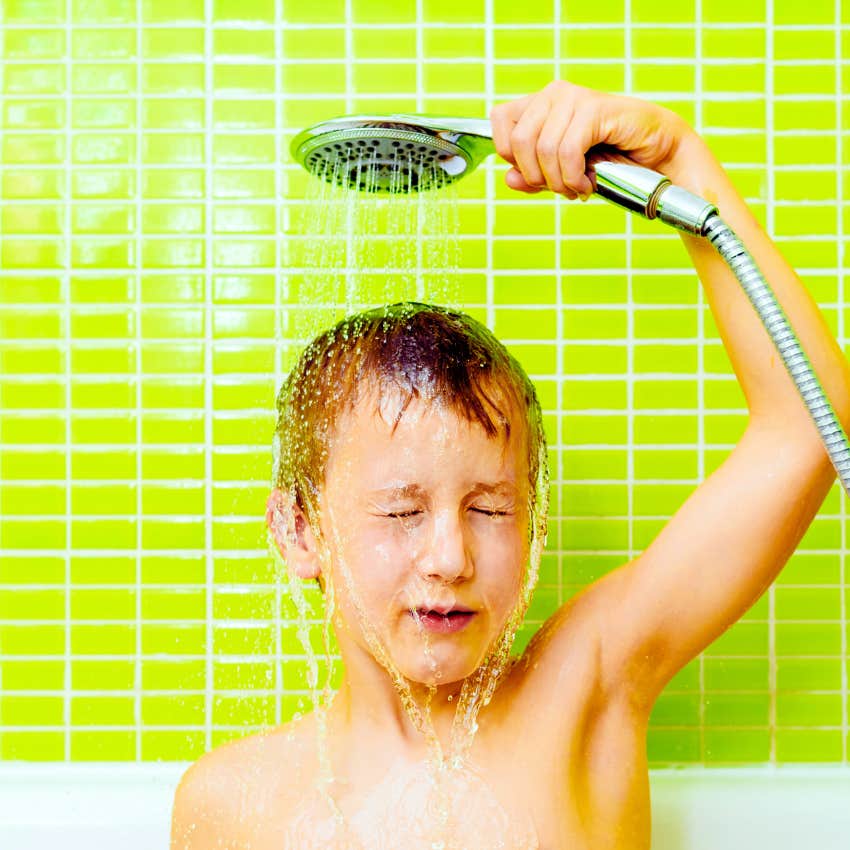 Teen boy getting clean