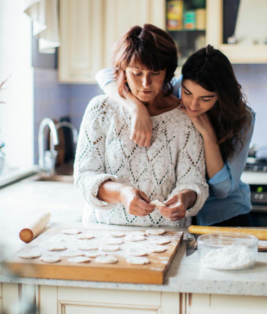 mom and daughter baking cookies