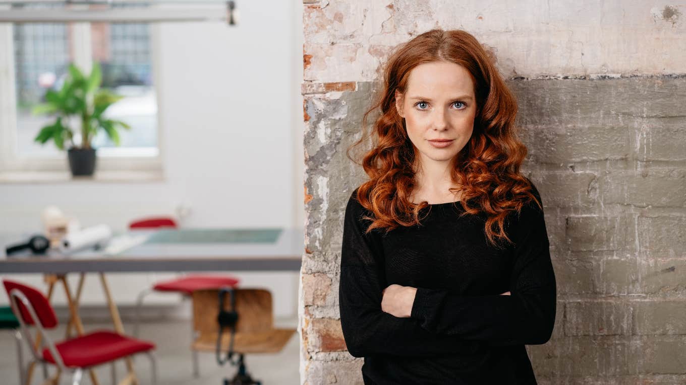 office worker with her arms crossed