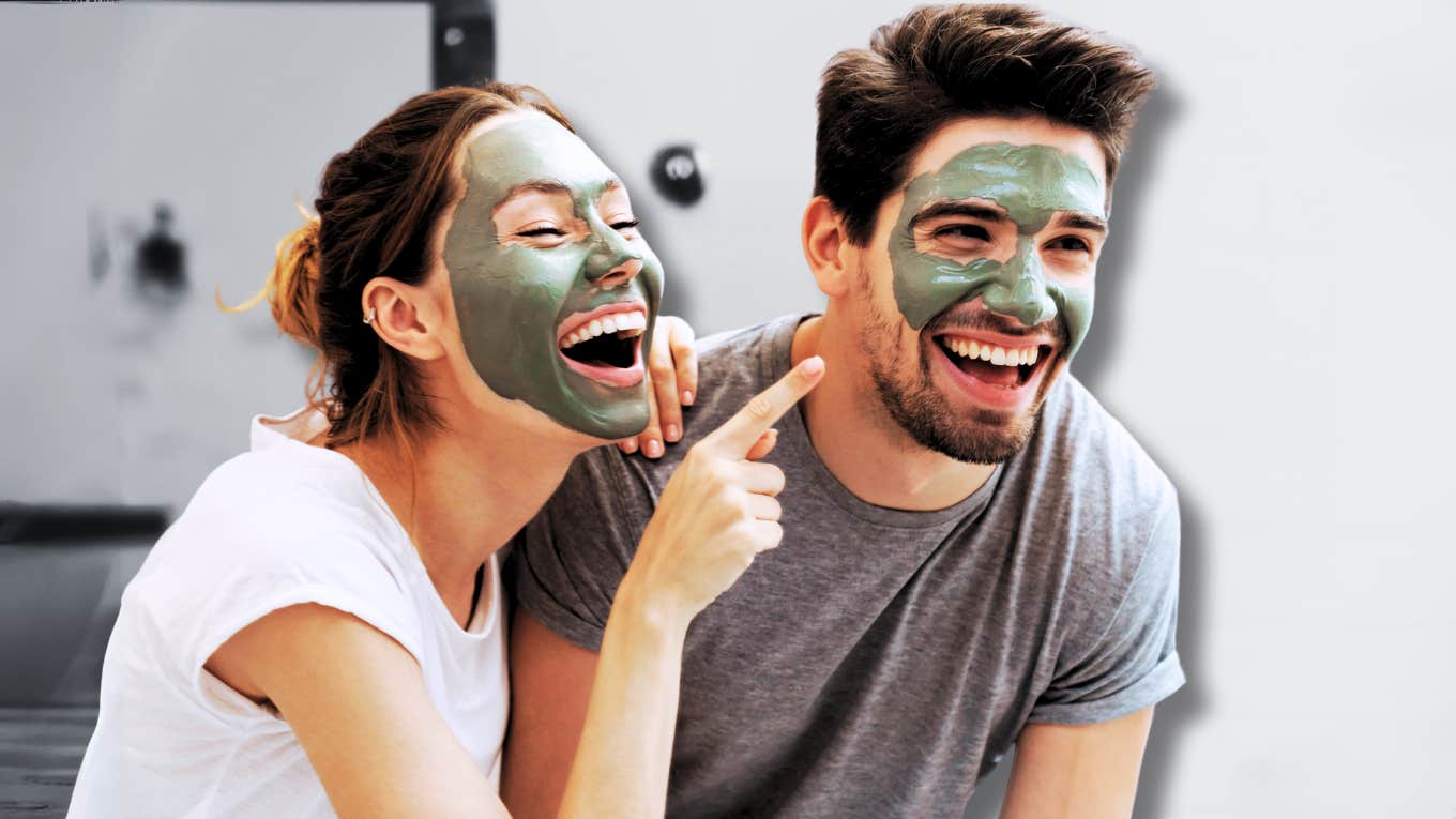 Man embracing his feminine side, mud masks with partner 