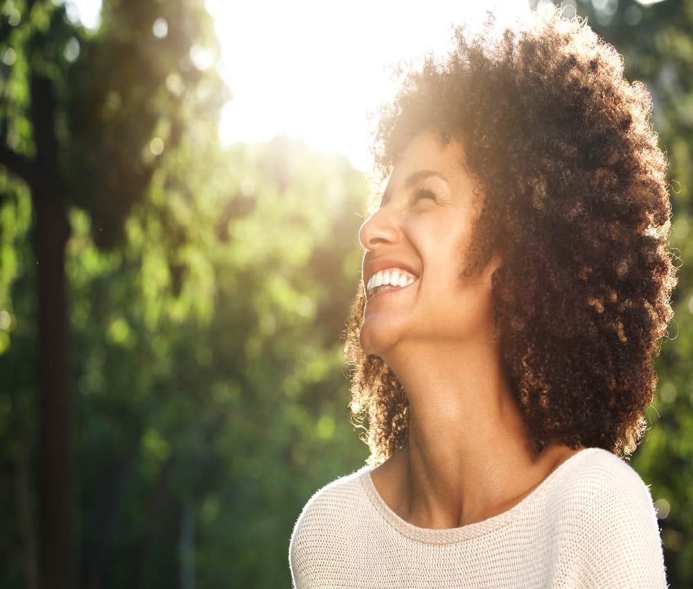 woman outside smiling