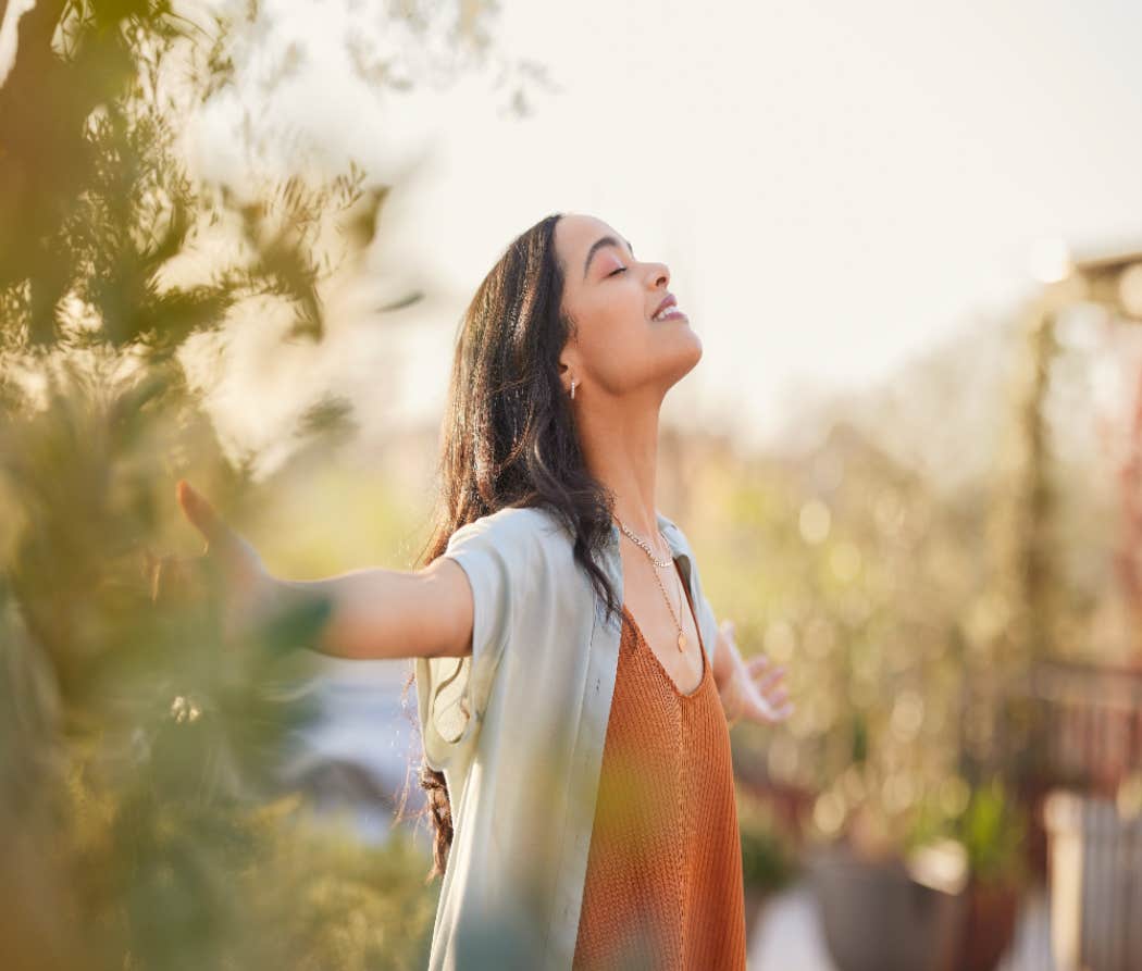 woman meditating outside