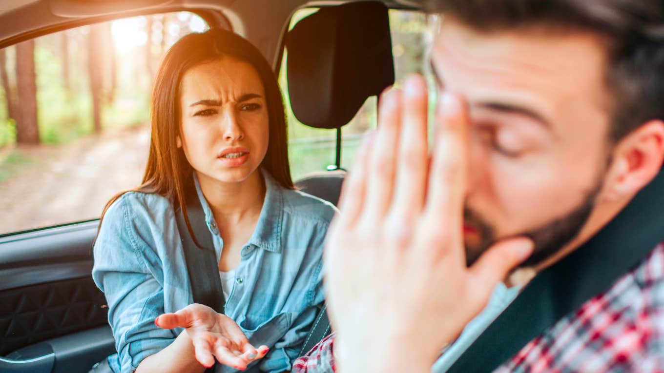 couple arguing in their car