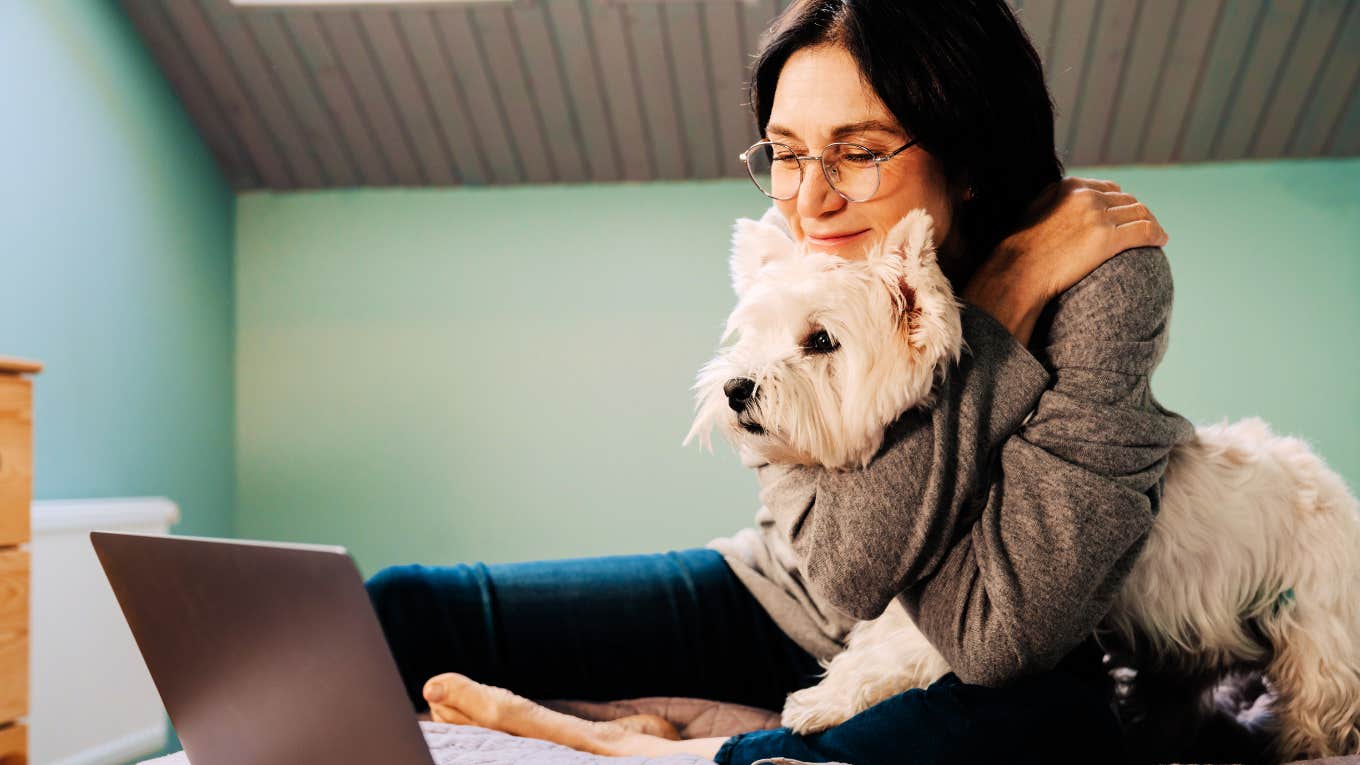 Woman loving on her sweet dog