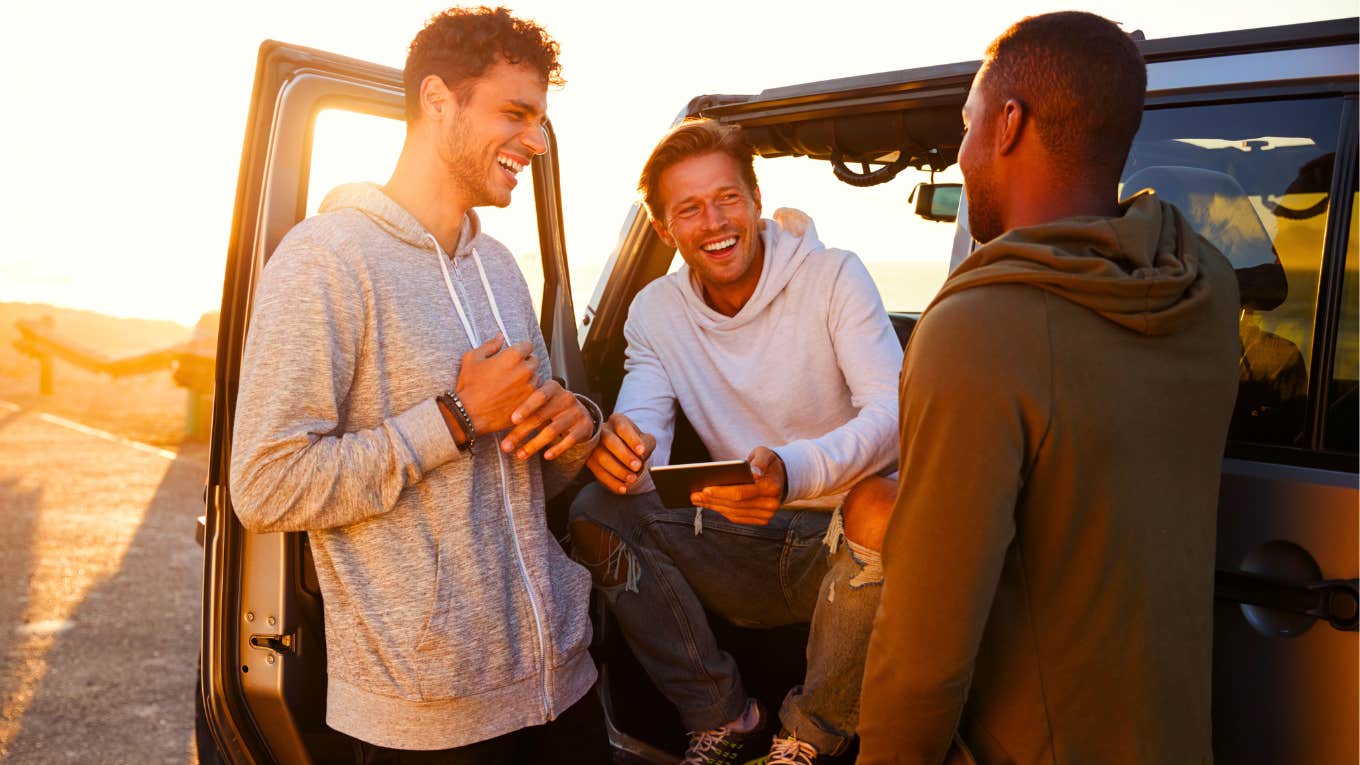 What People Still Get Wrong About Men's Emotions group of men standing together having fun