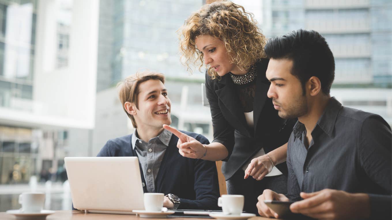 What To Say When A Co-Worker Throws You Under The Bus Co-workers having a meeting with their boss.