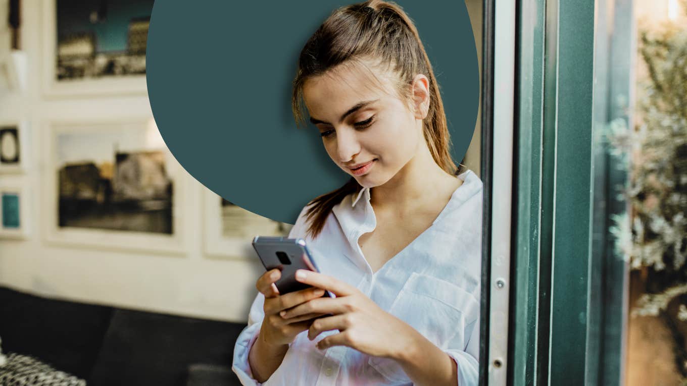 woman looking at phone, texting