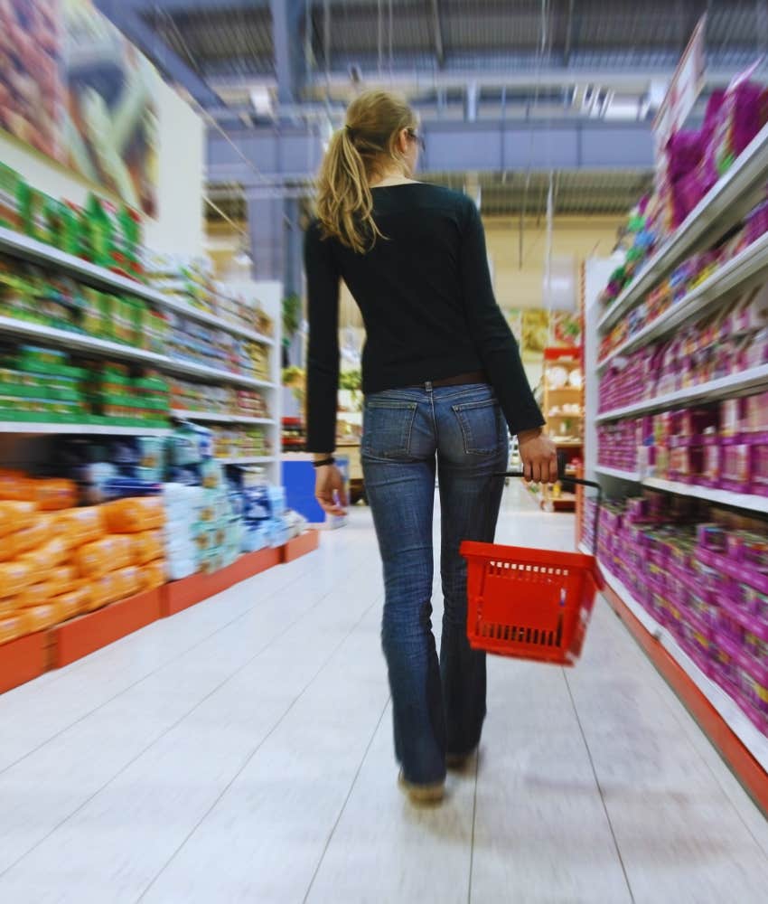 woman alone in grocery store