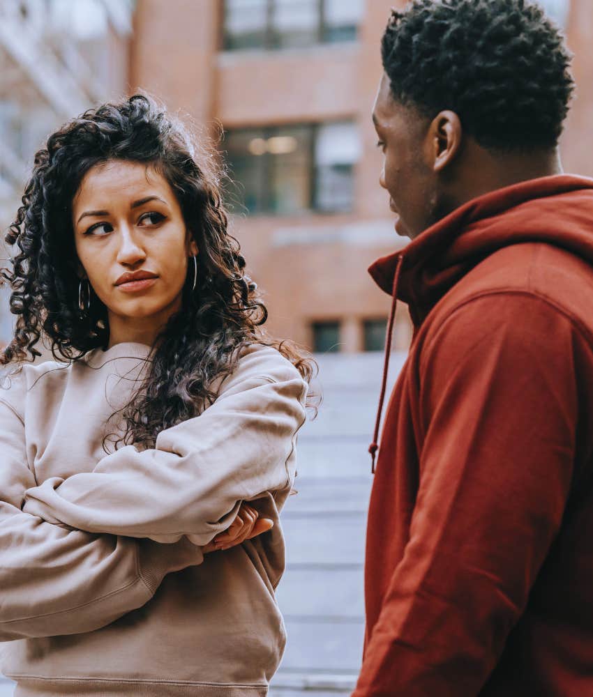 Woman not amused by her boyfriend