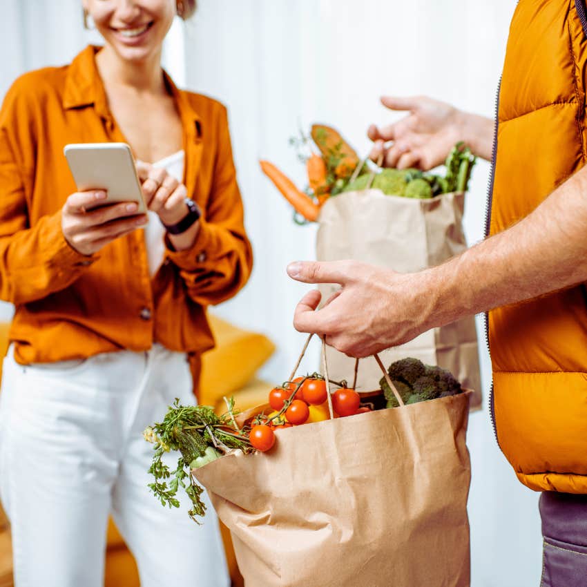 woman getting groceries delivered