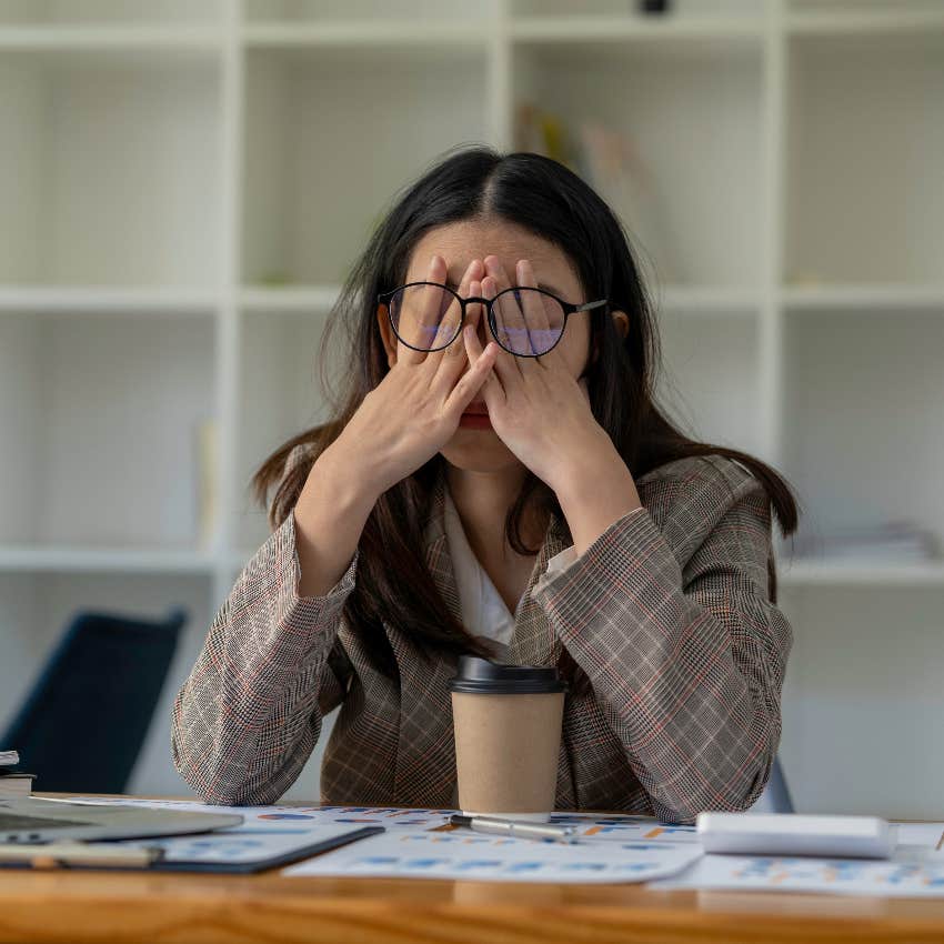 Woman stressed at soul-sucking job