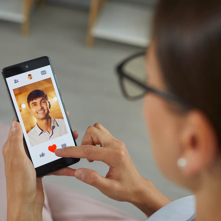 Woman swiping on Tinder. 