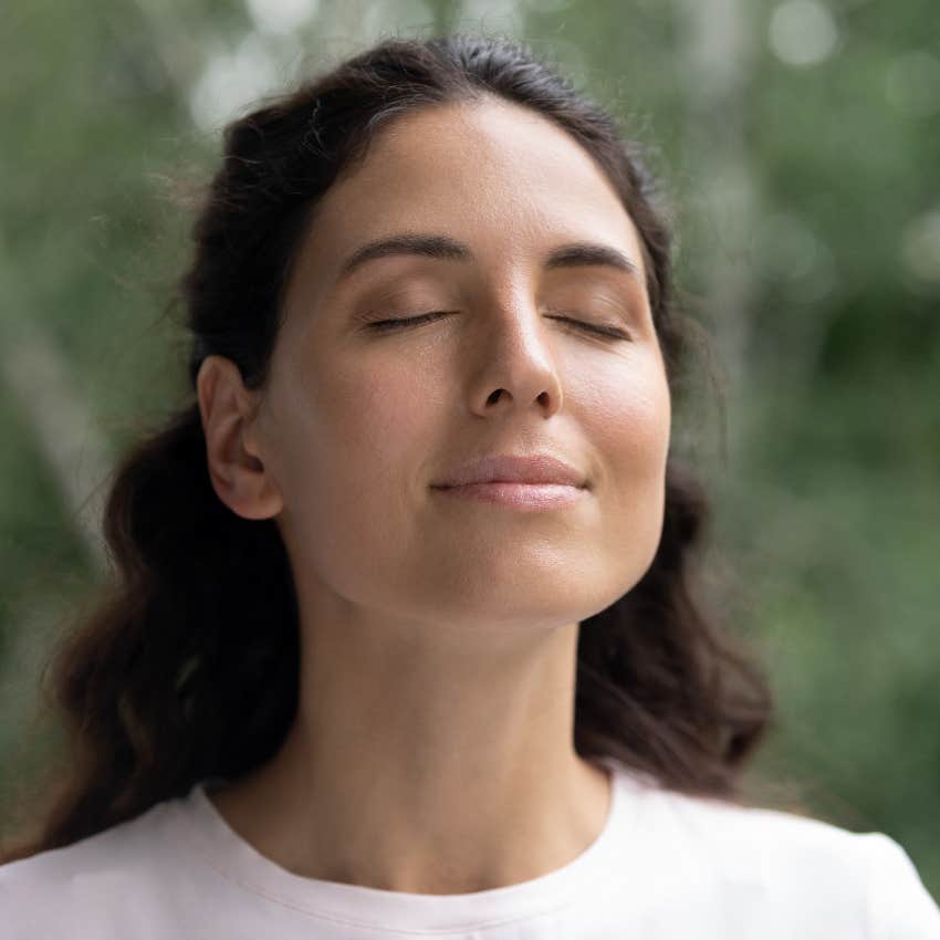 woman with eyes closed
