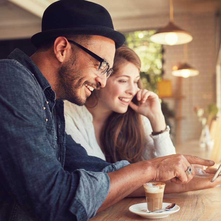 Friends chatting while drinking coffee together. 