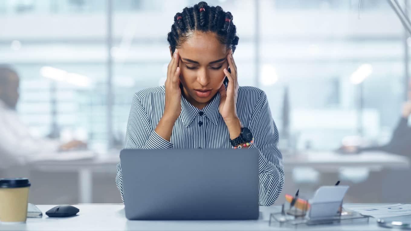 Worker Cries About Being ‘So Tired’ After Working 40 Hours Only Making $2K Monthly Young professional worker looking stressed.