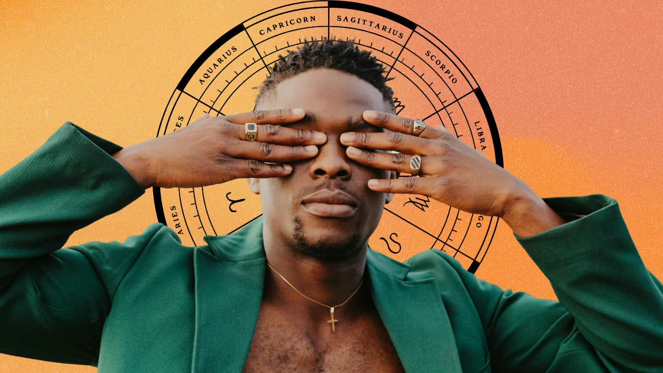 man learning life lesson covering his eyes with zodiac wheel