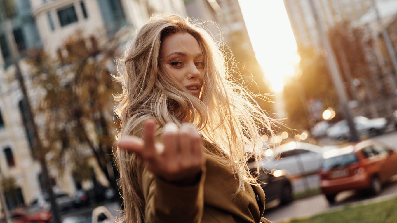 4 Tiny Steps To Follow The Law Of Detachment And Transform Your Personality confident woman in the city