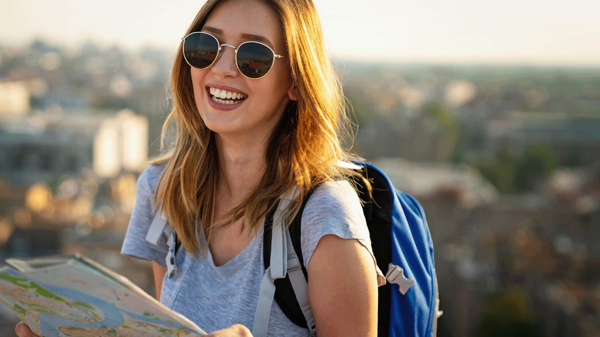 happy woman taking a selfie outdoors