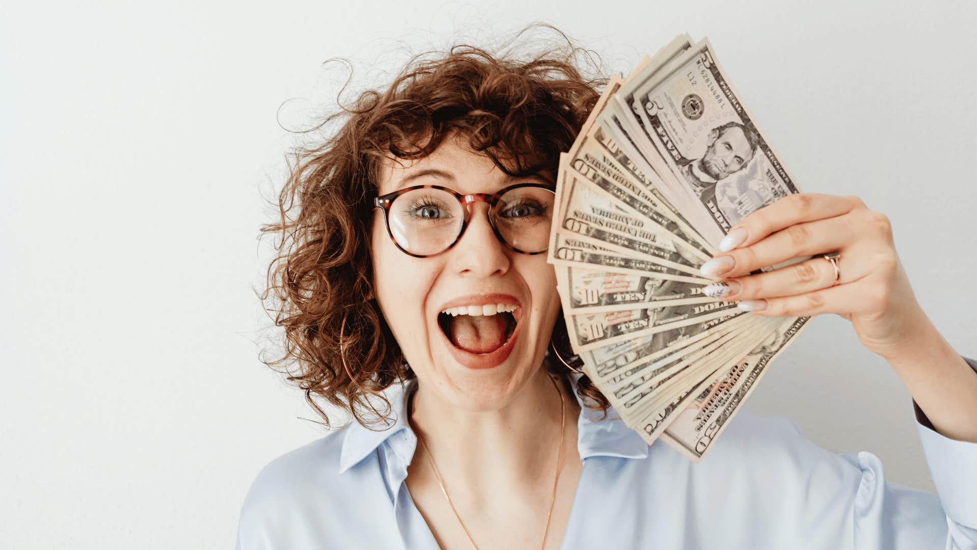 woman holding money