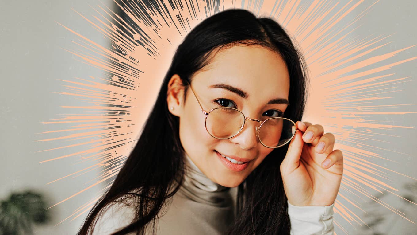 Confident woman, tipping her glasses down