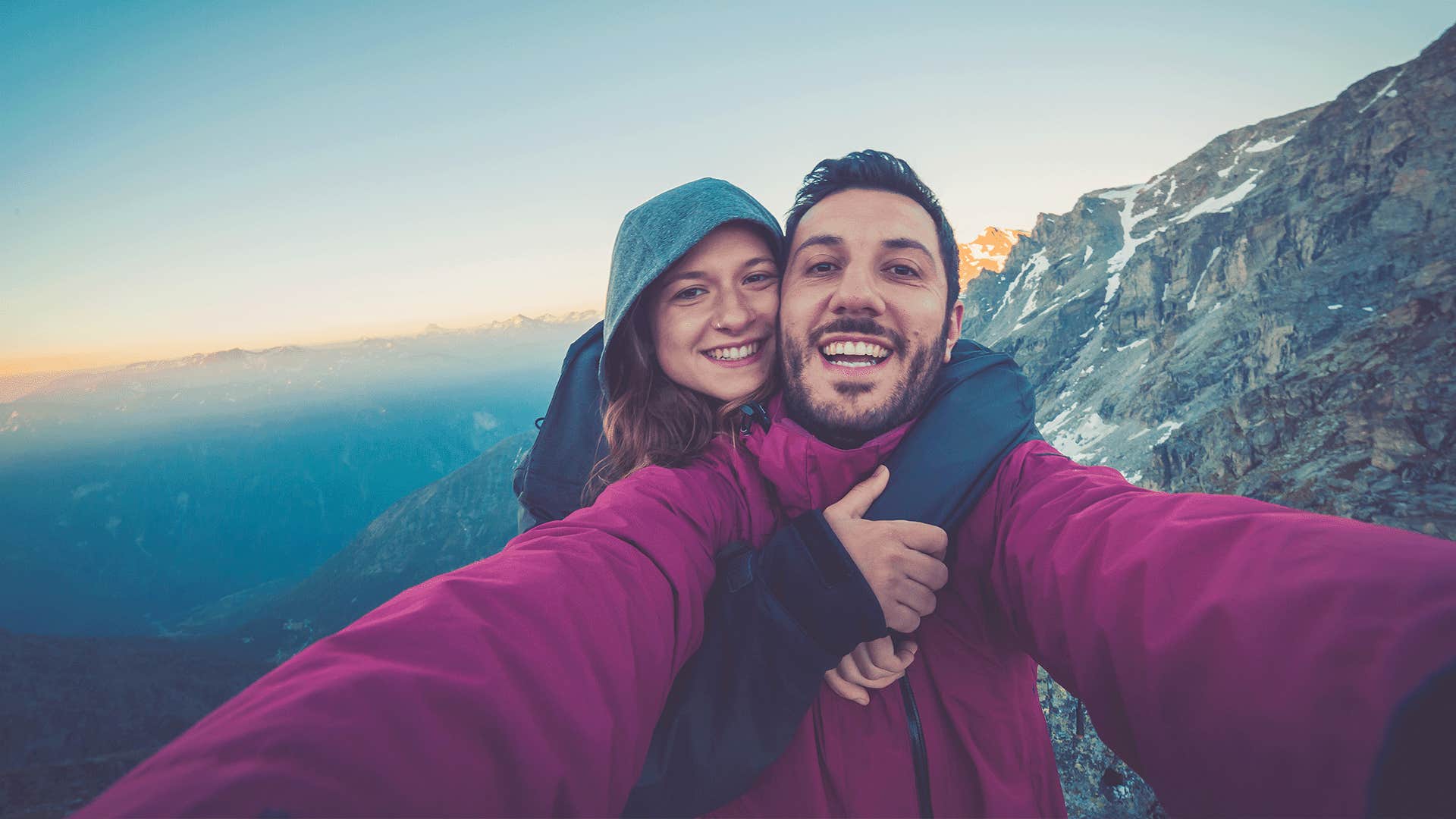 happy woman taking a selfie outdoors