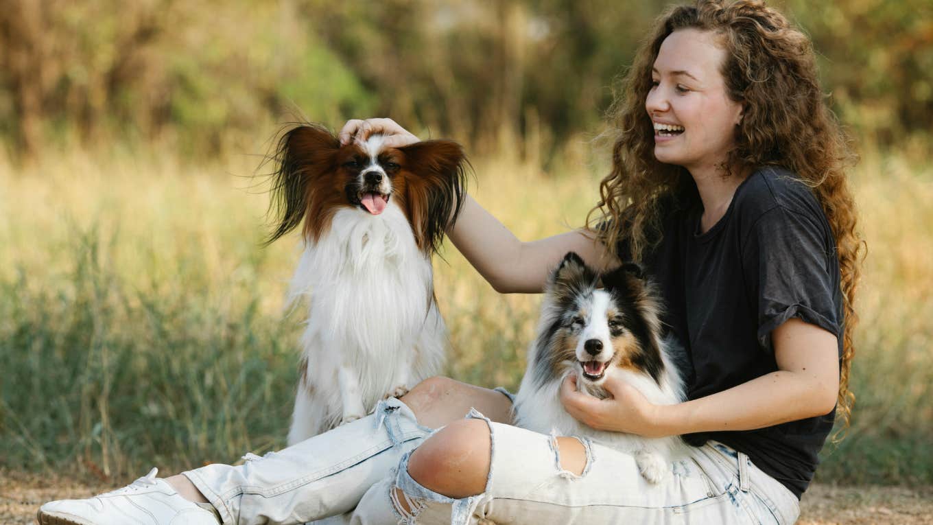 Dog Mom Reveals Why Pet Owners Should Say No To Petting Requests From Strangers More Often woman with two dogs