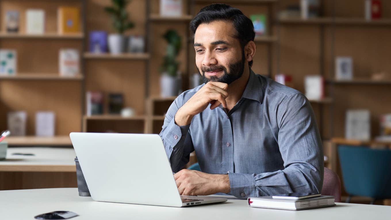 Employment Lawyer Reveals 3 Things Salaried Workers Need To Know Salaried worker sitting at his desk.