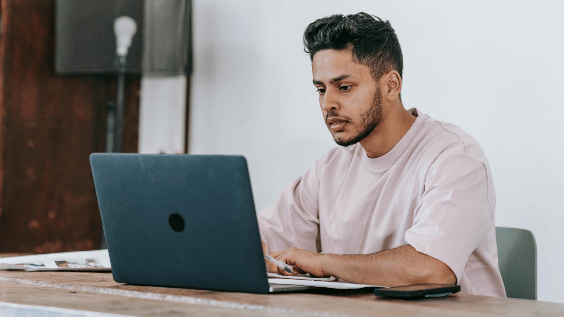 man working on computer