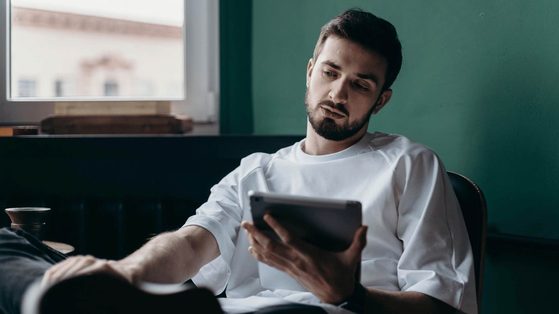 man procrastinating strategically