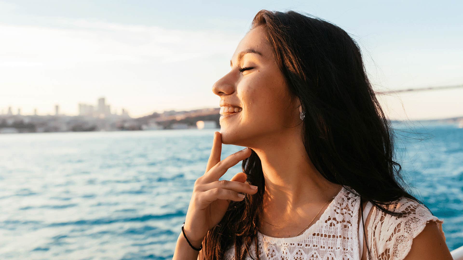 happy woman taking a selfie outdoors