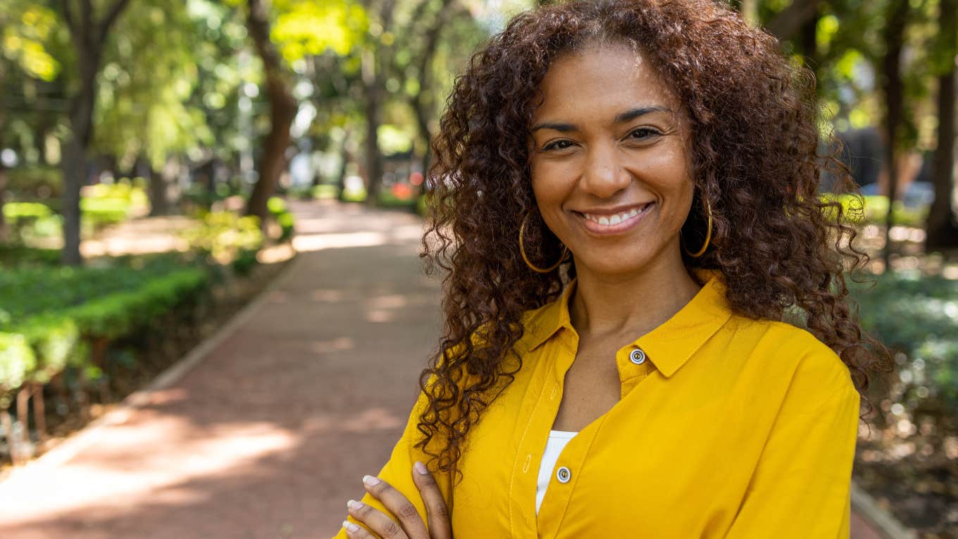 Rare Signs You're Highly Respected By Everyone happy woman smiling from being respected
