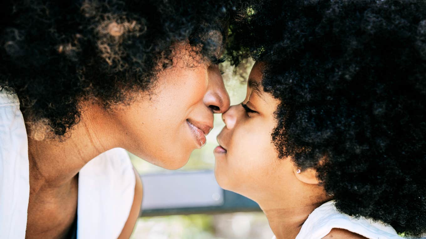 How To Help Your Children Survive Your Divorce Mother embracing child, during and after divorce