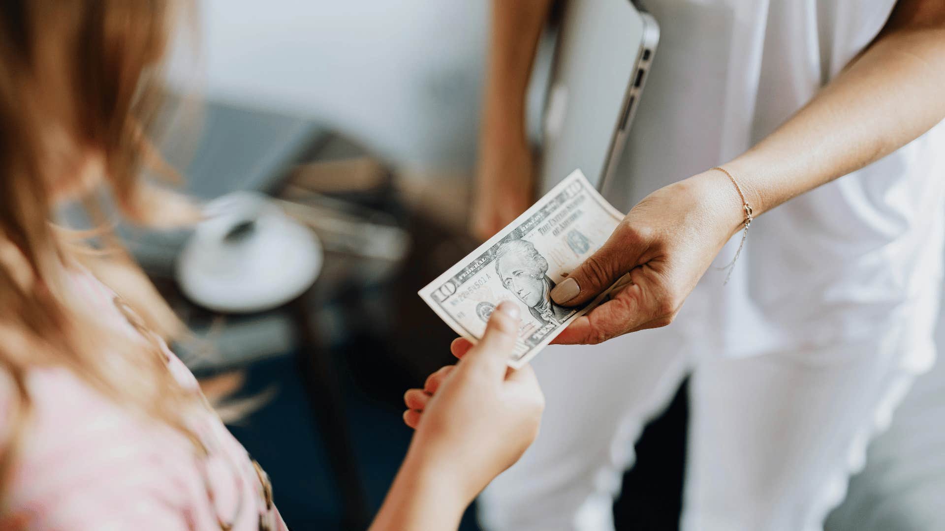 person paying money