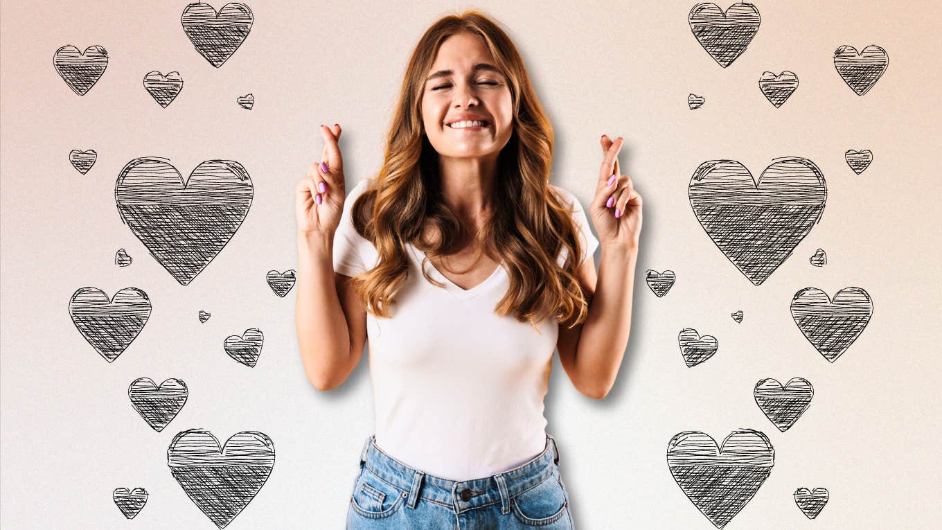 Relationship Coach Advice: Lies You're Telling Yourself Woman crossing her fingers, telling herself lies about relationships