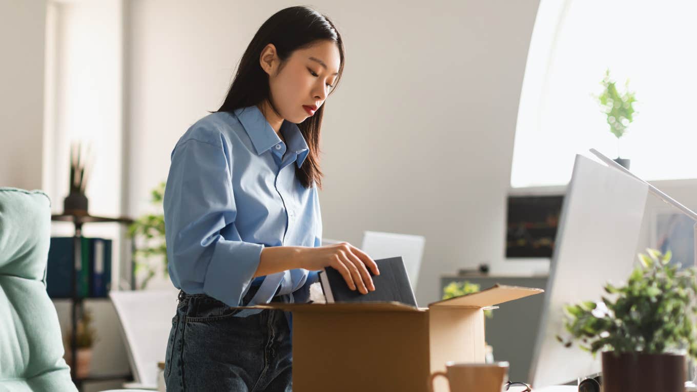 Luxury Beauty Worker Resigns From Dream Job That Made Her Feel Burned Out employee packing up office after resigning from job