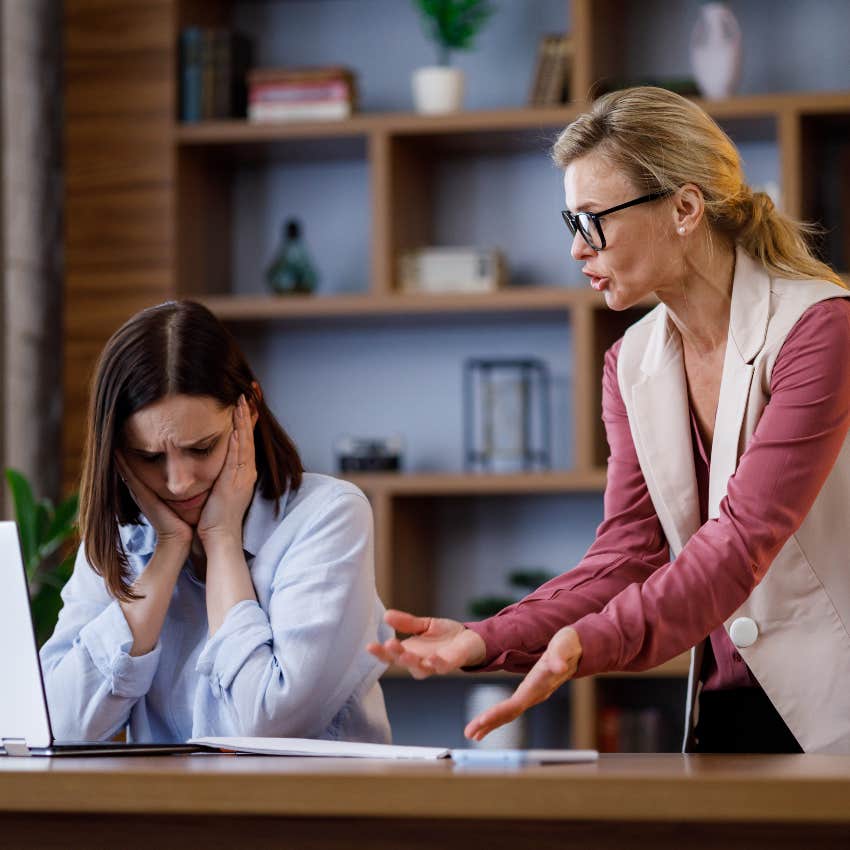 Boss scolding high performing employee