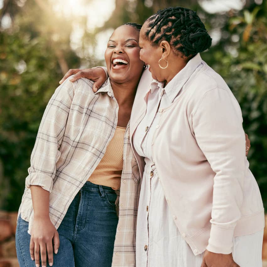 mom and daughter hugging