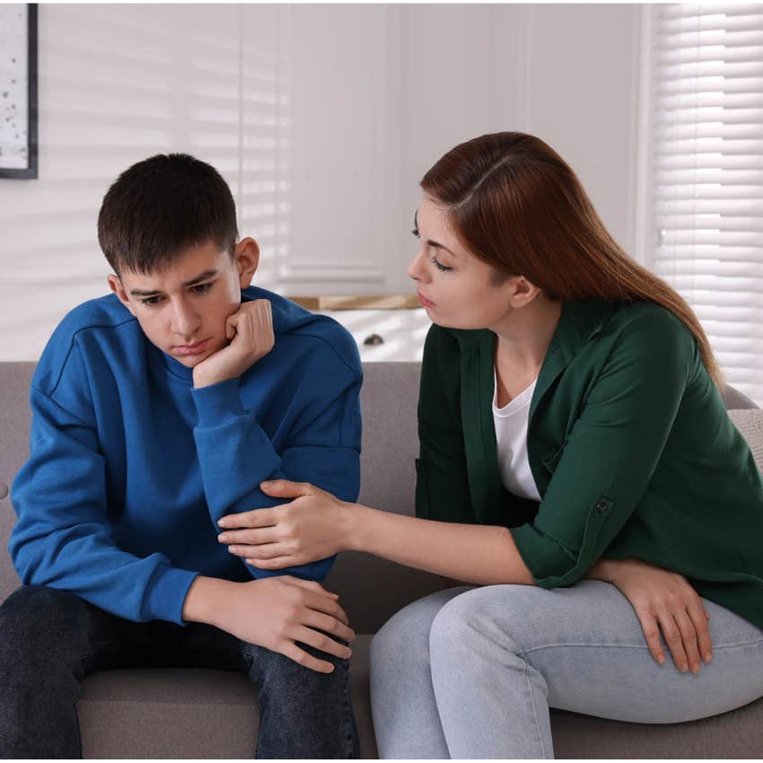 Teenage son talking with mom after being dumped. 