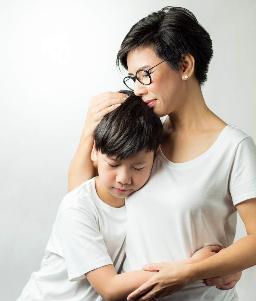 mom hugging son